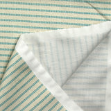 Coton imprimé à rayures hachurées turquoise fond beige clair