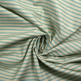 Coton imprimé à rayures hachurées turquoise fond beige clair