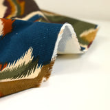 Sergé de coton élasthanne rupestre kaki et bleu