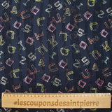 Mousseline imprimée bande satin alphabet fond marine