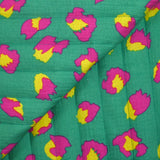 Double gaze matelassée double face Maui fond turquoise et magenta au mètre