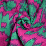 Double gaze matelassée double face Maui fond turquoise et magenta au mètre