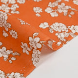 Viscose imprimée printanière blanc cassé fond orange