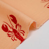 Double gaze imprimée homard rouge fond abricot