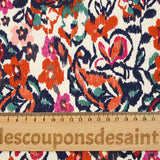 Jacquard de coton natté ikat fleuris orange et bleu fond blanc cassé