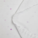 Viscose imprimée signes violet fond blanc