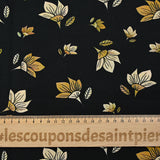 Popeline de coton imprimée fleur jaune pastel et miel fond noir