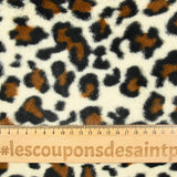 Fausse fourrure léopard fond beige