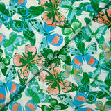 Viscose imprimée jacquard papillons bleus et verts fond blanc