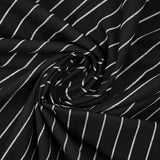Coton tissé-teint rayé blanc fond noir