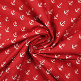 Coton imprimé ancre marine blanche fond rouge