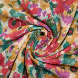 Voile polycoton imprimé taches de couleur turquoise, rouge et orange