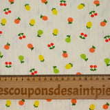 Jersey pointelle coton imprimé tutti frutti fond blanc cassé