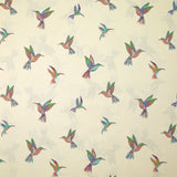 Coton imprimé envolée de colibris fond écru