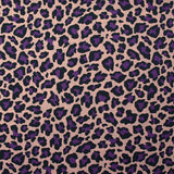 Coton imprimé léopard violet fond rose chair