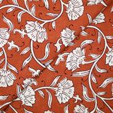 Coton indien imprimé Deepti fleurs blanches fond rouille