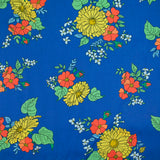 Coton liberty ® Tropical Sprig fond bleu au mètre