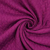 Jersey matelassé tresses fond magenta