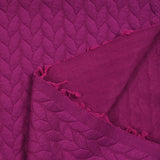 Jersey matelassé tresses fond magenta