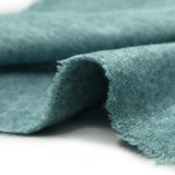 Maille Iris fond turquoise