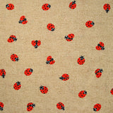 Polycoton imprimé coccinelle fond ficelle
