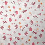 Popeline de coton imprimée poésie florale rose fond blanc
