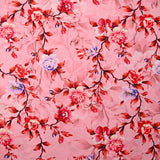 Popeline de coton imprimée romantisme corail fond rose