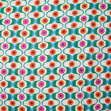 Viscose imprimée agitation verte et orange fond blanc
