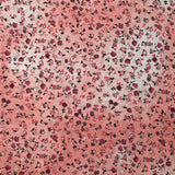 Voile de viscose imprimé fleurs dansantes fond rose brumeux