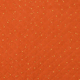 Double gaze matelassé orange confettis doré vendu au mètre