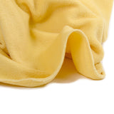 Tissu polaire jaune zinc