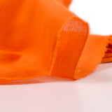 Vela de algodón de naranja