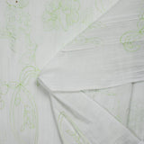 Polycoton froissé et brodé fleurs vert anis
