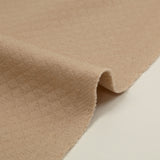 Jersey matelassé 100% coton petits losanges beige