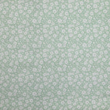 Piqué de coton imprimé fleurs printanière fond vert