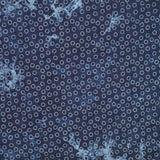 Chambray matelassé imprimé tie and dye cercle en pétales