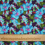 Coton imprimé fleurs exotiques bleu et vert fond violet