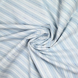 Popeline polycoton jacquard rayure blanche, gris-bleue et bleue marine doupionnée