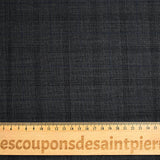 100% Prince of Wales wool tailoring fabric, black, blue, dark gray background
