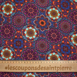 Coton imprimé kaléidoscope floral violet et bleu
