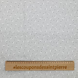 Piqué de coton imprimé pissenlit fond gris