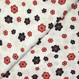 Coton imprimé marguerite noir et rouge fond blanc