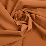 Toile polyester extensible orange brûlé