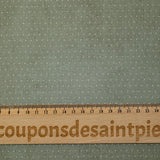 Coton imprimé pois 1mm fond tie and dye vert sauge