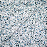 Coton imprimé ouragan floral bleu fond blanc