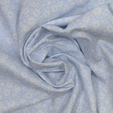 Piqué de coton imprimé fleurs printanière fond bleu clair
