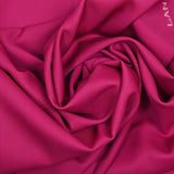 Gabardina de lana virgen rosa fucsia