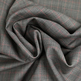 100% Prince of Wales wool suit fabric, black, red, off-white background