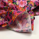 Coton imprimé bouquet flamboyant rose fond noir