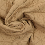 Jersey matelassé triangle fond beige